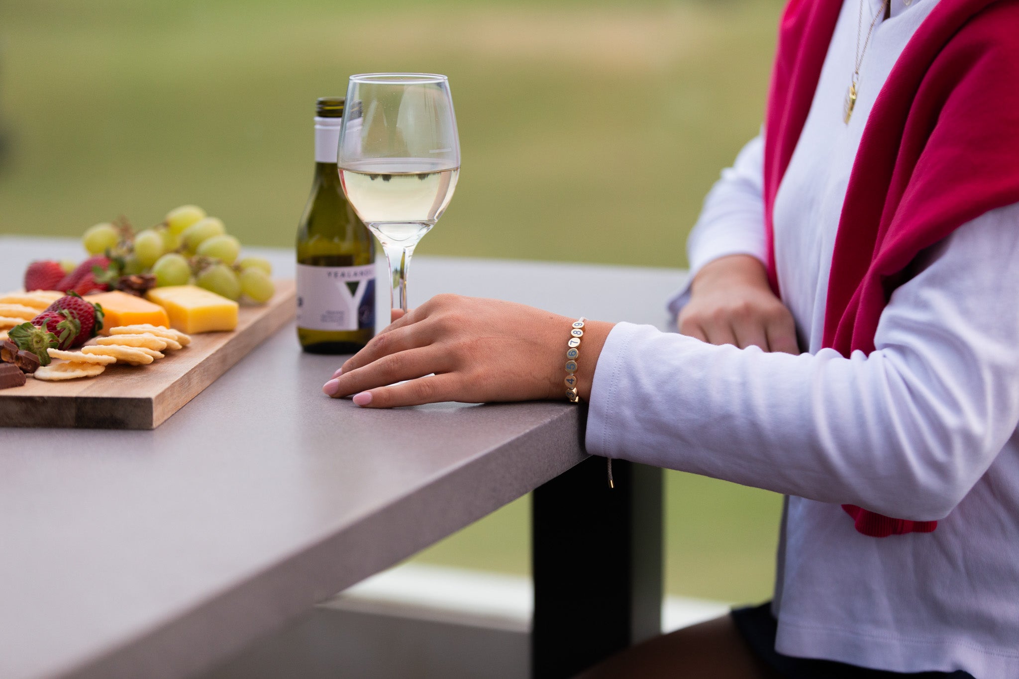 Birdie Club womens golf score counter bracelet with gold plating, at the club house.